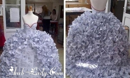 بالصور .. فستان زفاف مصنوع من أوراق الطلاق