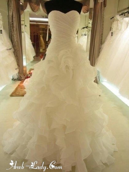 تألقي في يوم زفافك بهذه الفساتين الرائعه