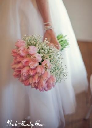 بوكيه الورد للعروس عنصر أساسى فى يوم زفافها