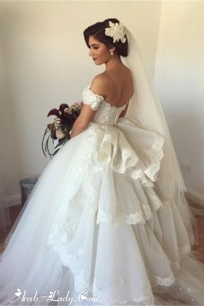 فستان الزفاف المنفوش بلمسة الورود جمالية مثالية لعروس شتاء 2017 