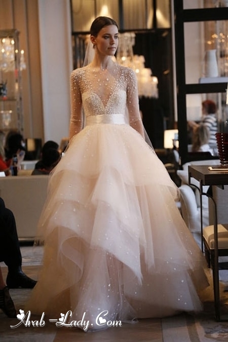 تألقي بموضة فستان الزفاف متعدد الطبقات لأناقة مثالية في ليلة العمر