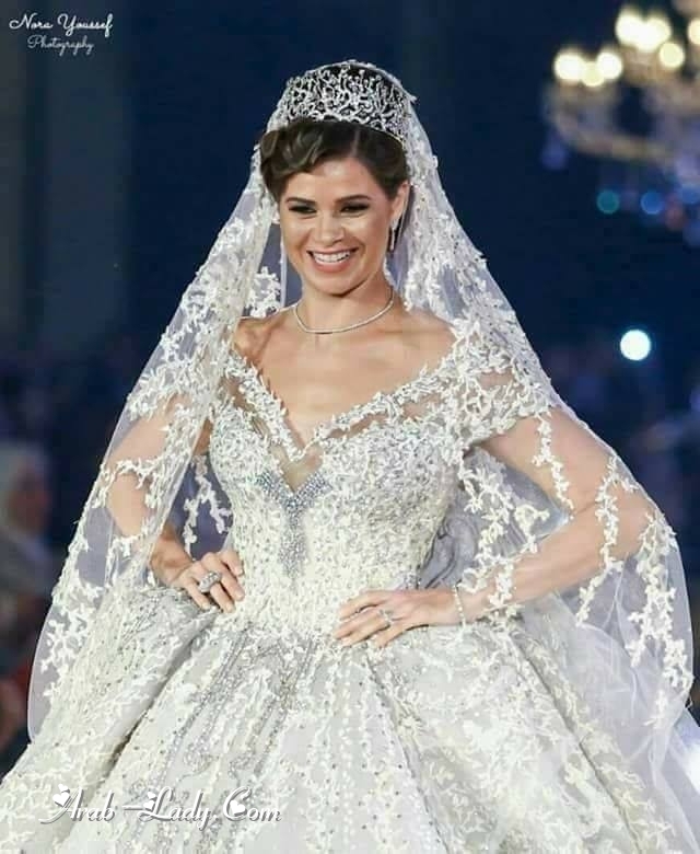 بالصور|يسرا اللوزي ترتدي أغلى فستان زفاف في العالم مرصع بالالماس