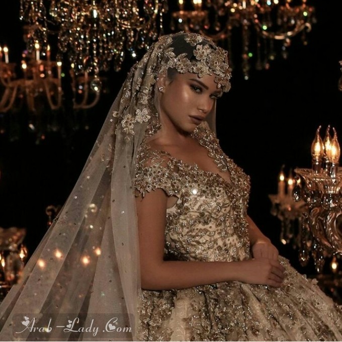 بالصور| فساتين زفاف ذهبي لطلة آسرة للقلوب